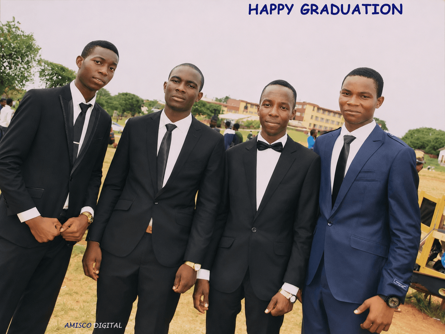 Four classmates on graduation day.